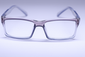 Close-up of Clear and Purple Gradient Plastic Eyeglasses